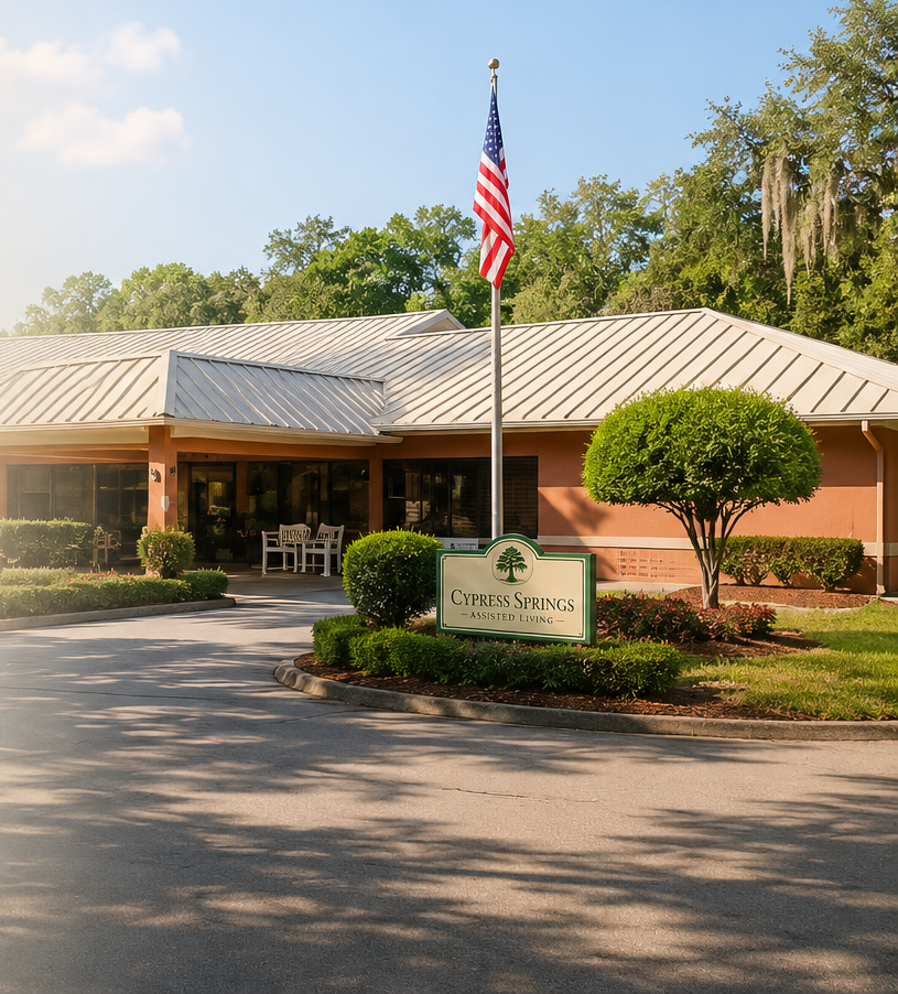 Cypress Springs Assisted Living exterior with American flag